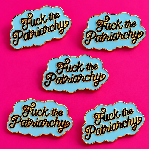 Five cloud-shaped enamel pins with the text 'Fuck the Patriarchys' in brown cursive lettering on a light blue background, arranged on a bright pink background.